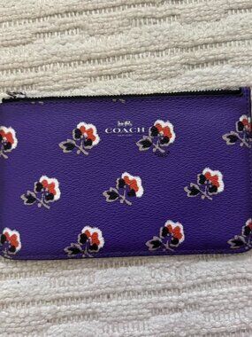 Purple floral Coach Wristlet